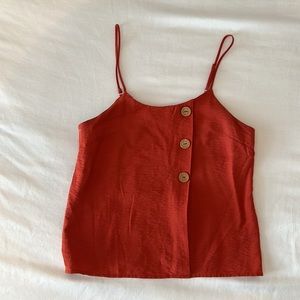 Rusty red button detail tank
